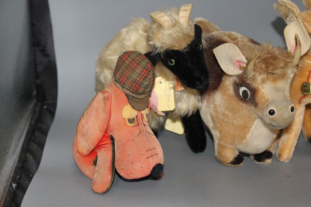 A group of vintage Steiff and other soft toy animals